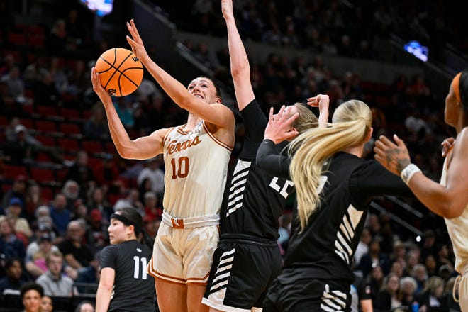 Mar 29, 2024; Portland, OR, USA; Texas Longhorns guard Shay Holle (10) scores a basket during the first half against Gonzaga Bulldogs guard Brynna Maxwell (22) in the semifinals of the Portland Regional of the 2024 NCAA Tournament at the Moda Center at the Moda Center.